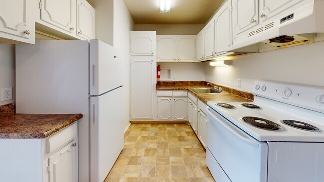 Apartamento Home de dos dormitorios - Cocina - Kendall Manor Apartments