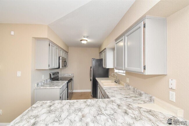 Building Photo - 8676 E 38th Pl