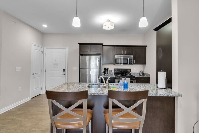 Foto del edificio - Furnished 2-Bedroom, 2-Bath Apartment near UB North
