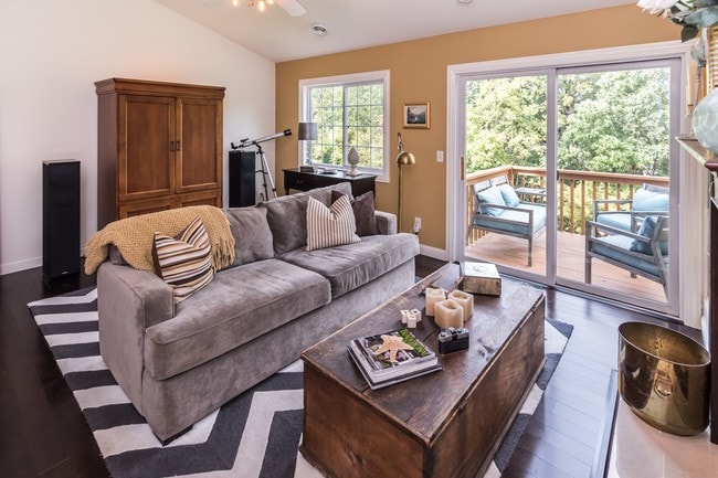 Living room that leads to a lovely deck and private views. - 1102 Bergmann Dr