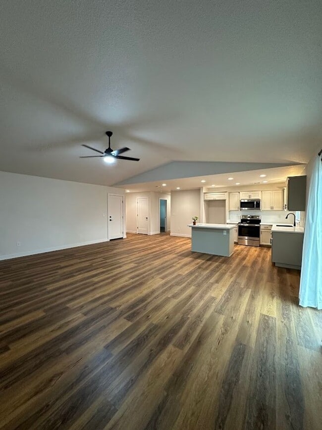 Building Photo - Updated Home with Island Kitchen, LVP Floo...