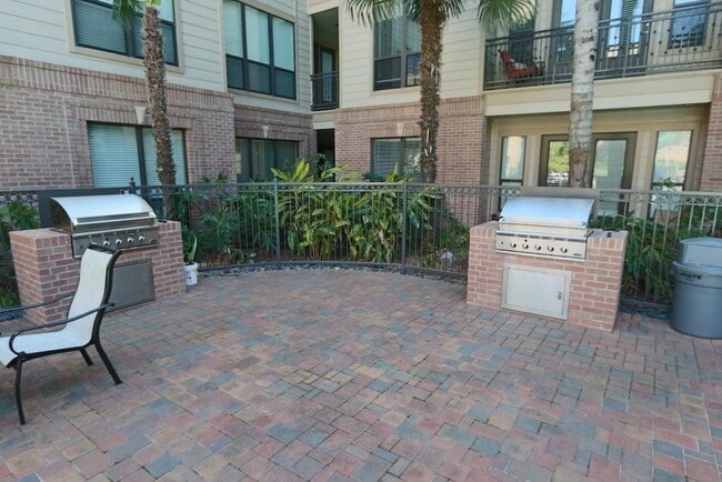 Building Photo - Fully Furnished Sugar Land Town Square Condo – Some Utilities Included