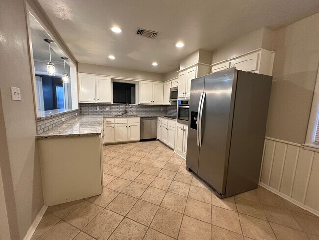 Building Photo - Large home with updates
