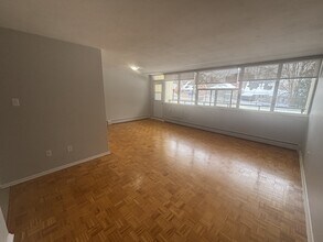 Building Photo - 1061 Queen's Blvd