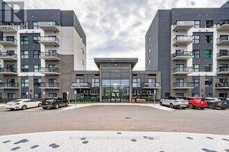 Building Photo - 102-102 Grovewood Common