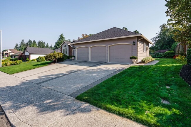 Building Photo - Beautifully Landscaped 1/4 acre with Well Maintained 4 bedroom 2 Bath Home with 3 Car Garage