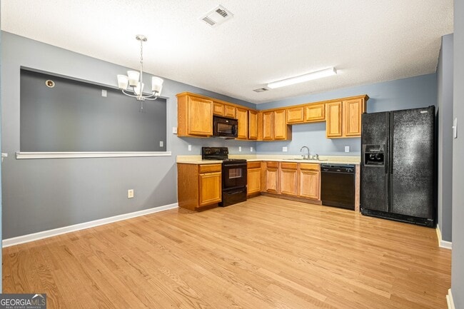 Building Photo - 5955 Raventree Ct