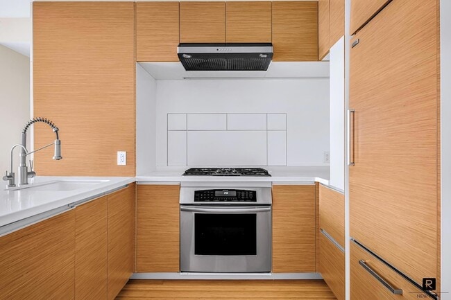 Building Photo - 2 River Ter.