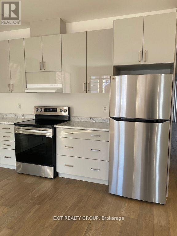 Photo du bâtiment - 211 Dundas St W