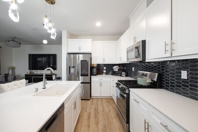 Building Photo - Modern 3-Story Townhouse in Agualuna!