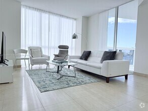 Building Photo - 18201 Collins Ave
