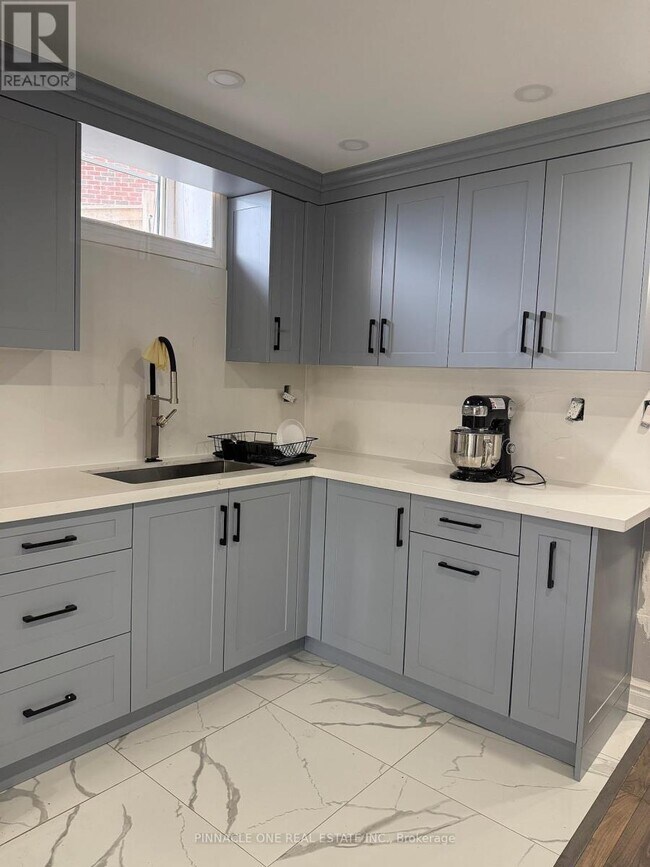 Photo du bâtiment - 23 Purdy Pl