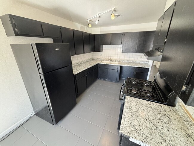 Foto del edificio - 6940 Hopkins Dr