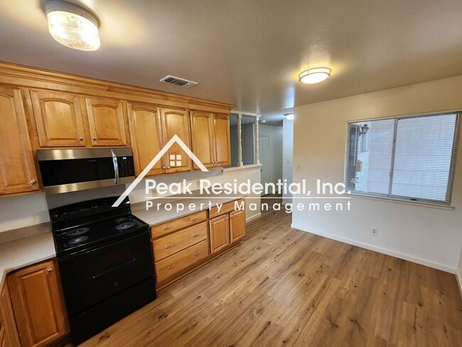 Building Photo - 4 br, 2 bath House - 6913 Weddigen Way