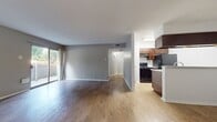 This well-designed one-bedroom apartment in Addison Apartments At The Park 2 maximizes its 620 square feet of living space. The open floor plan creates a seamless flow between the living areas, enhancing the sense of spaciousness. The apartment features durable wood-look flooring throughout, providing a contemporary and low-maintenance surface.

The primary bedroom, measuring 160 square feet, is generously sized and includes a ceiling fan for added comfort. The living room is bright and airy, with a sliding glass door that leads to an outdoor area, allowing natural light to flood the space. The kitchen, while compact, is efficiently designed with modern cabinetry and appliances.

The bathroom is clean and functional, with a shower/tub combination and ample storage. A hallway and closet provide additional storage solutions. The apartment's neutral color palette, predominantly in soft grays and whites, creates a calming atmosphere and allows for personalization.

Ceiling-mounted light fixtures and strategically placed windows ensure the space is well-lit. The apartment's layout is thoughtfully planned, making the most of the available square footage and creating a comfortable living environment. This unit, A1COW (OW-112), offers a perfect blend of functionality and style for single occupants or couples seeking a modern urban living space.