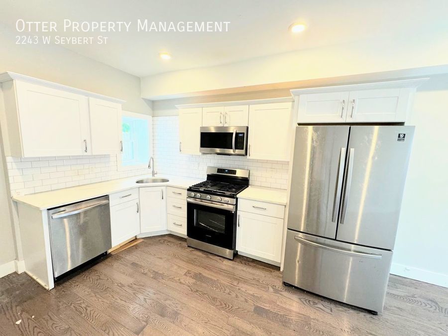 Primary Photo - Modern 4BR/2.5BA Home with Washer/Dryer & ...