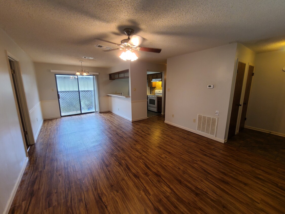 Open floor plan living room and dining area! - 1748 Port Dr