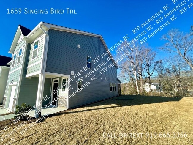 Building Photo - 1659 Singing Bird Trl