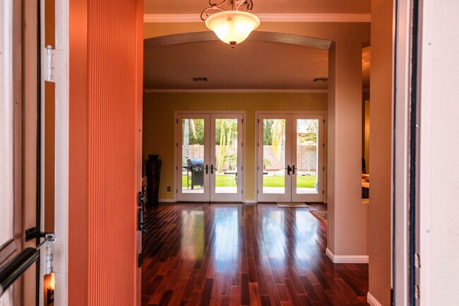 Entrance with view to yard/water fountain - 974 E Erie Ct