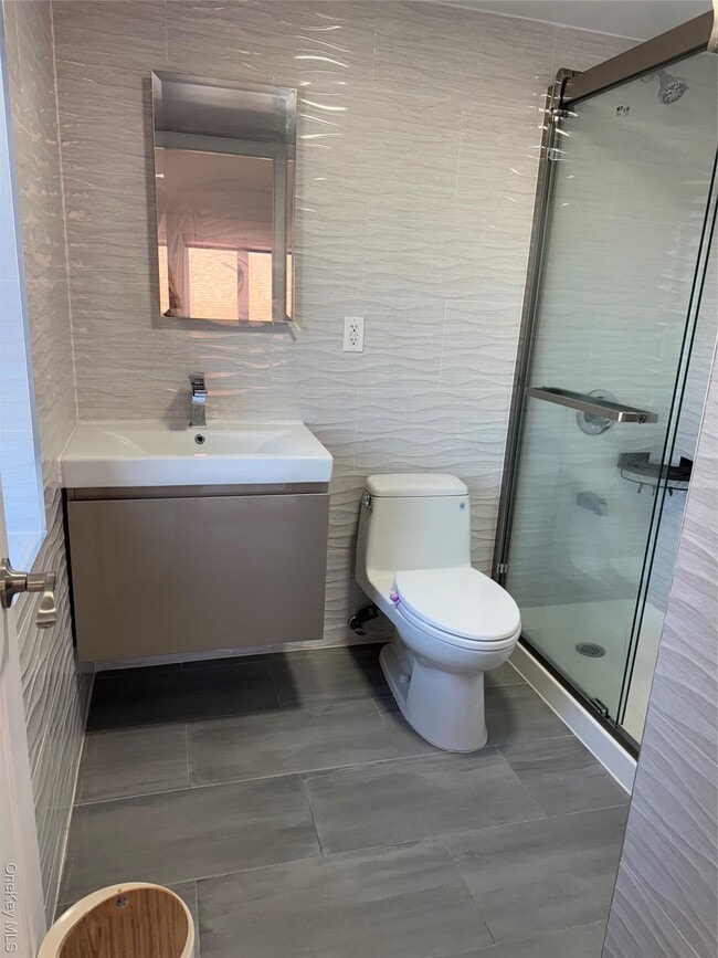 Building Photo - 132-25 57th Ave