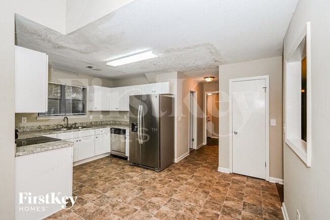 Foto del edificio - 6668 Windwood Cir