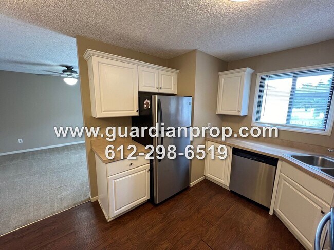 Building Photo - Coon Rapids Townhome Available Now, Open F...