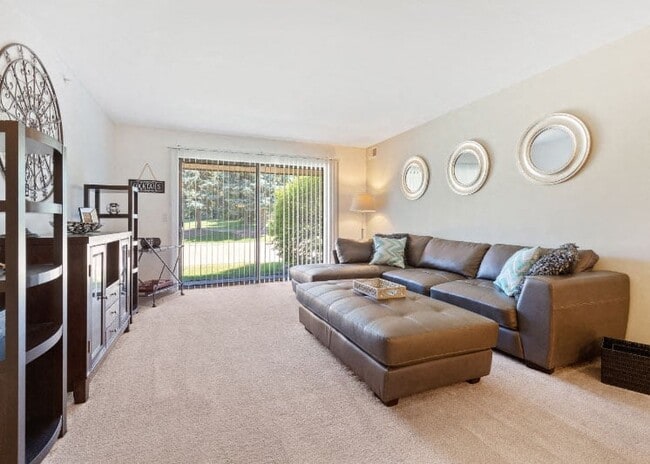 Open and airy Living Area with natural light at Dover Hills Apartments Kalamazoo MI - Dover Hills Apartments