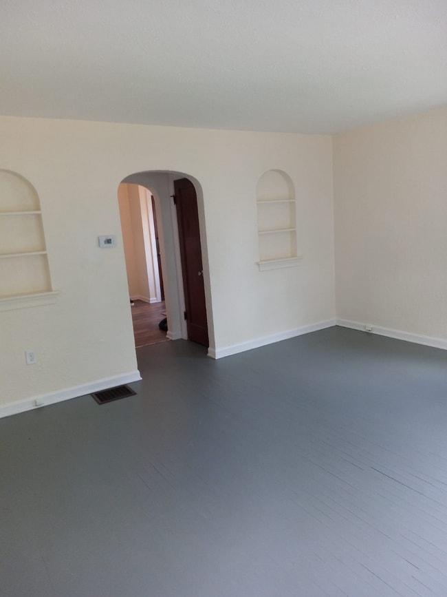 Large living room at 15.3 X 15.6 with shortest couch wall at 6 feet. - 2051 Parkhill Dr
