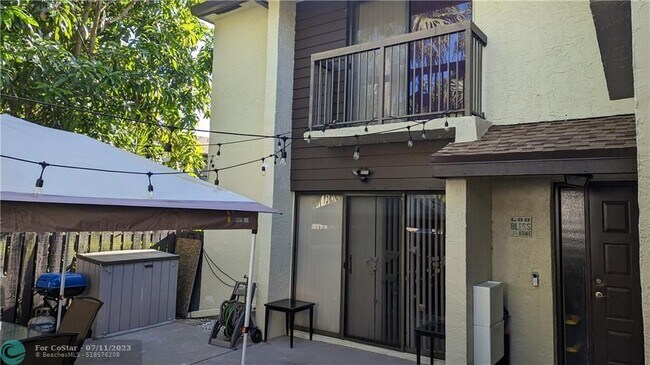 Building Photo - 3387 Cocoplum Cir