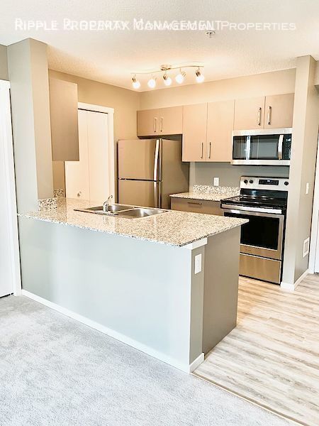 Building Photo - GORGEOUS 2 BED + DEN/ 2 BATH CONDO IN COMMUNITY OF SKYVIEW