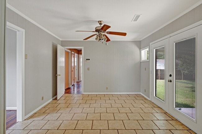 French doors onto covered back patio - 5017 W Durrett Dr