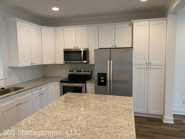 Building Photo - 4 br, 4.5 bath House - 129 S. Debardeleben St