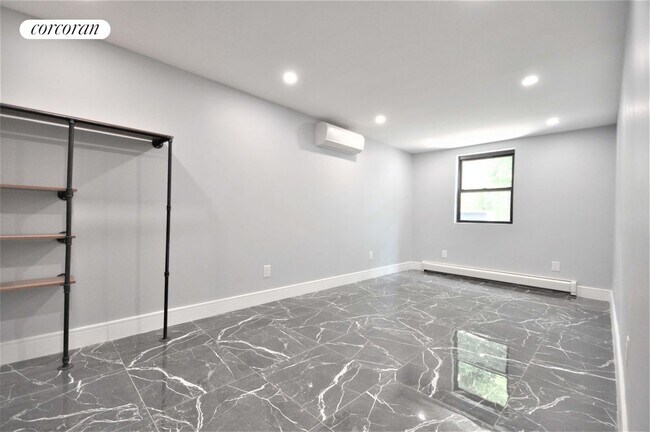 Building Photo - 49 E 56th St