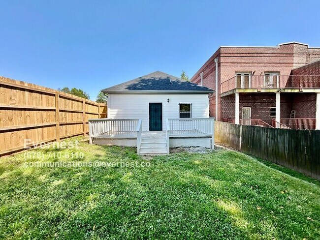 Building Photo - Spacious 4-Bedroom Home with Front Porch a...