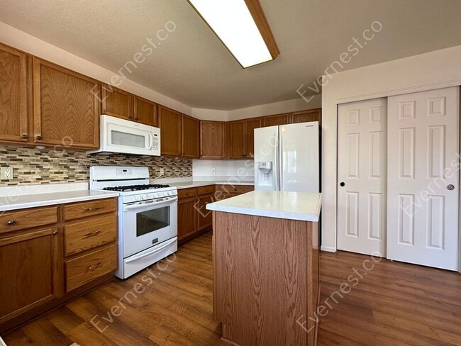 Foto del edificio - 6431 E 114th Ave