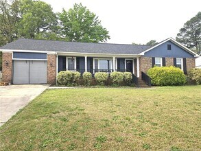 Building Photo - 6873 Brasswood Dr