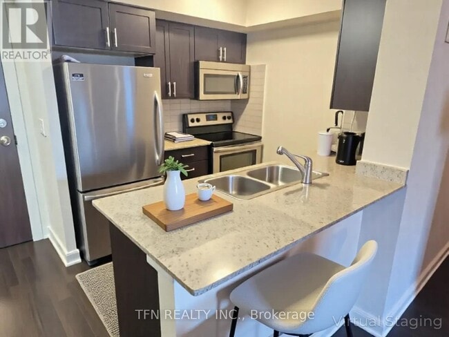 Photo du bâtiment - 6 Eva Rd