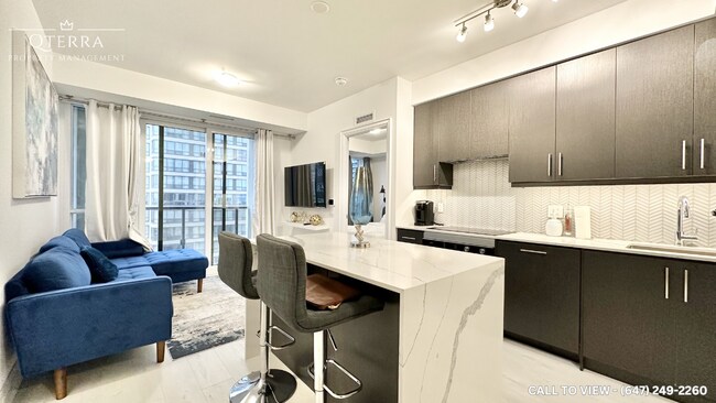 Photo du bâtiment - 36 Elm Dr W