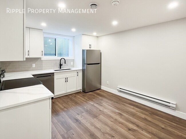 Photo du bâtiment - Brand New Spacious 1 Bedroom Basement Suite | 3 Months Free Internet | Pets Friendly