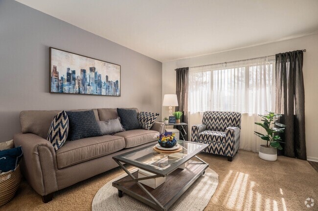 Spacious Living Room at Drawbridge Apartments East in Harrison Township, MI - Drawbridge Apartments East