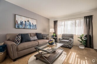 Spacious Living Room at Drawbridge Apartments East in Harrison Township, MI - Drawbridge Apartments East