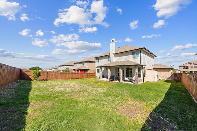 Building Photo - Spacious 5-Bedroom Home with Granite Count...