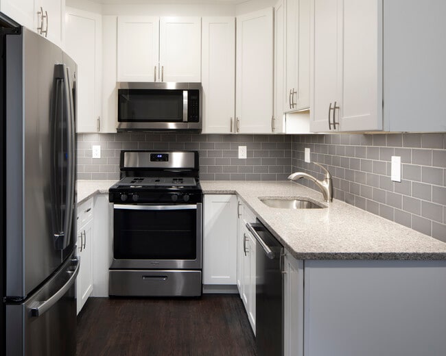 Building Photo - The Cornerstone: Heat, Gas, Hot & Cold Water Included, Elevator, Cat & Dog Friendly