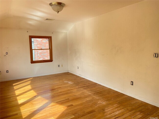 Building Photo - 13-67-67 209th St