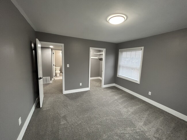 Master Bedroom with walk in closet and bathroom access - 1220 Chatham Park Dr