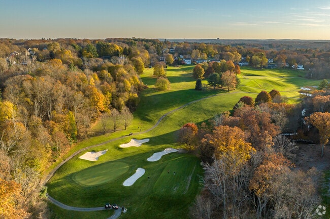Warm afternoon light rakes across the Trull Brook Golf Course in North Tewksbury.