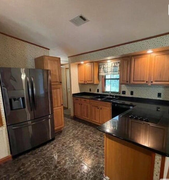 Foto del edificio - **Beautiful 4/2, 2 Car Garage Home in 55 P...