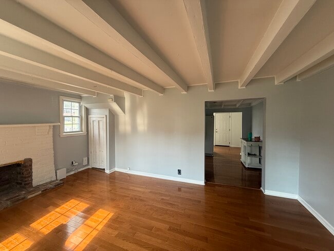 Living room with lots of natural light. Google fiber and Simplisafe Smart Lock already set up - 1624 Porter Ave