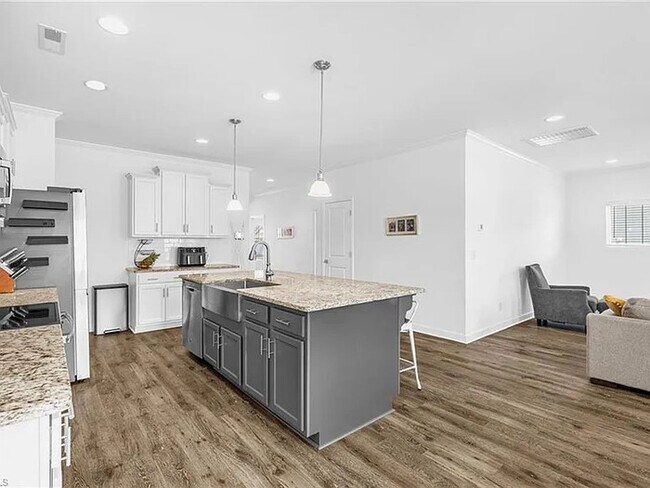 Building Photo - Earn Wealth While Leasing - Like a Homeown...