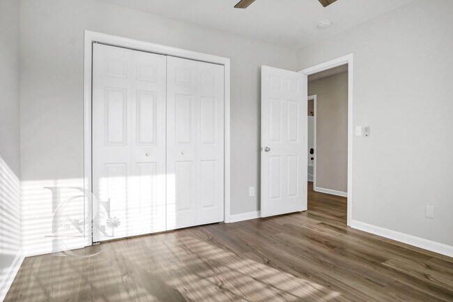 Building Photo - TWO BEDROOM GARDEN HOME IN GATED COMMUNITY